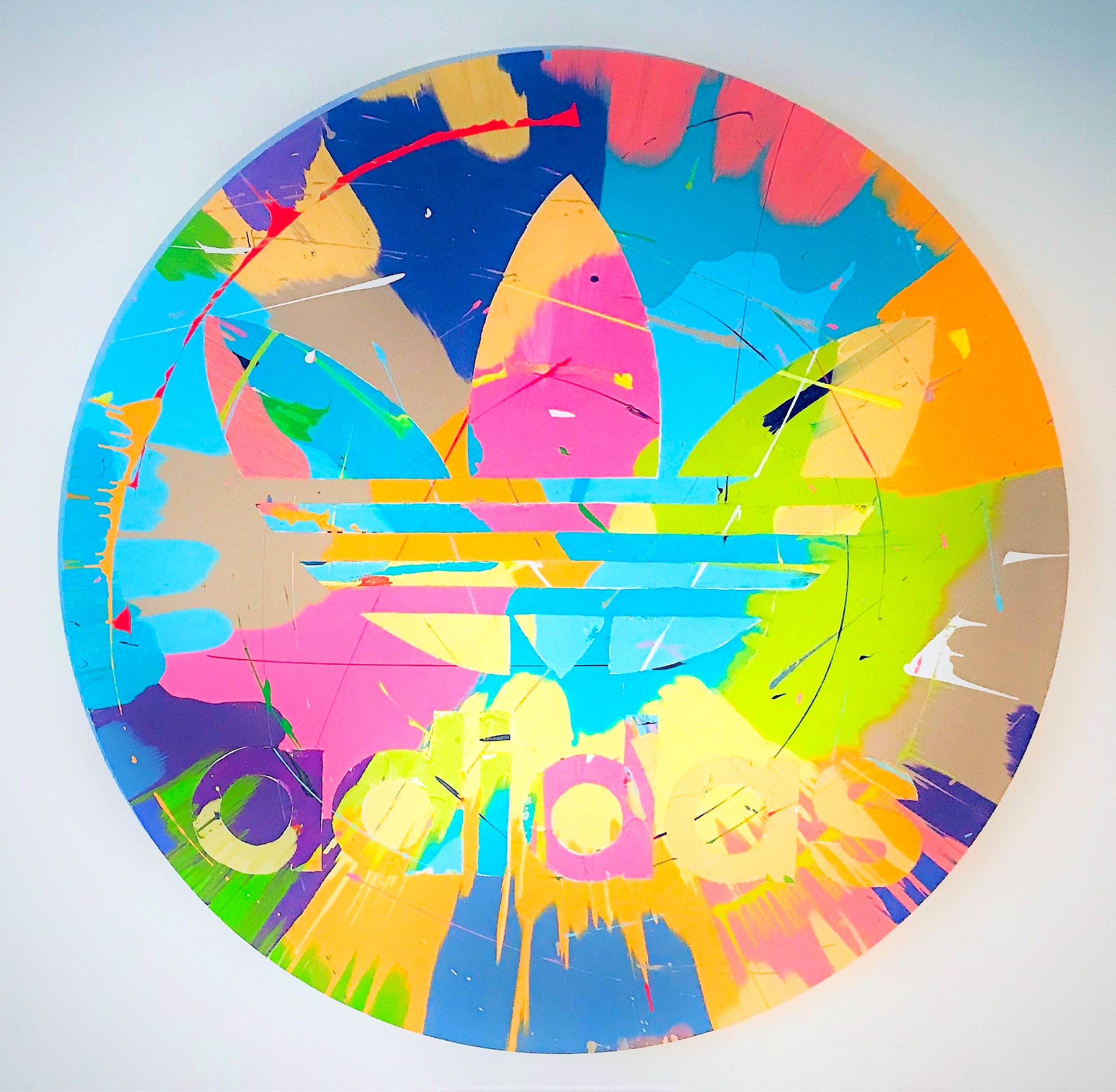 Finished round artwork with an Adidas emblem