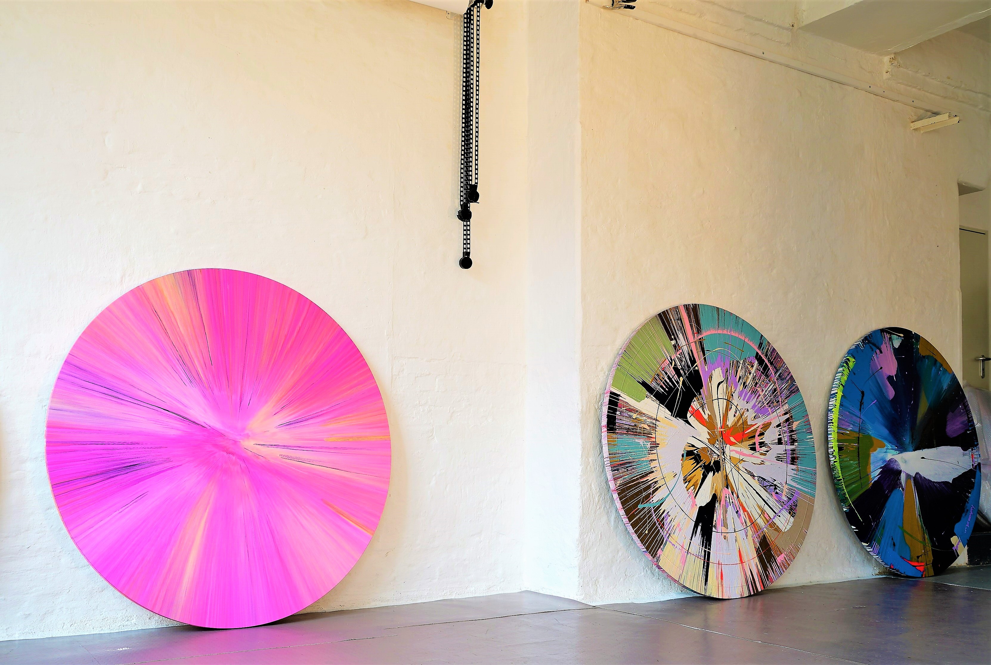 Three large-format round originals in the studio