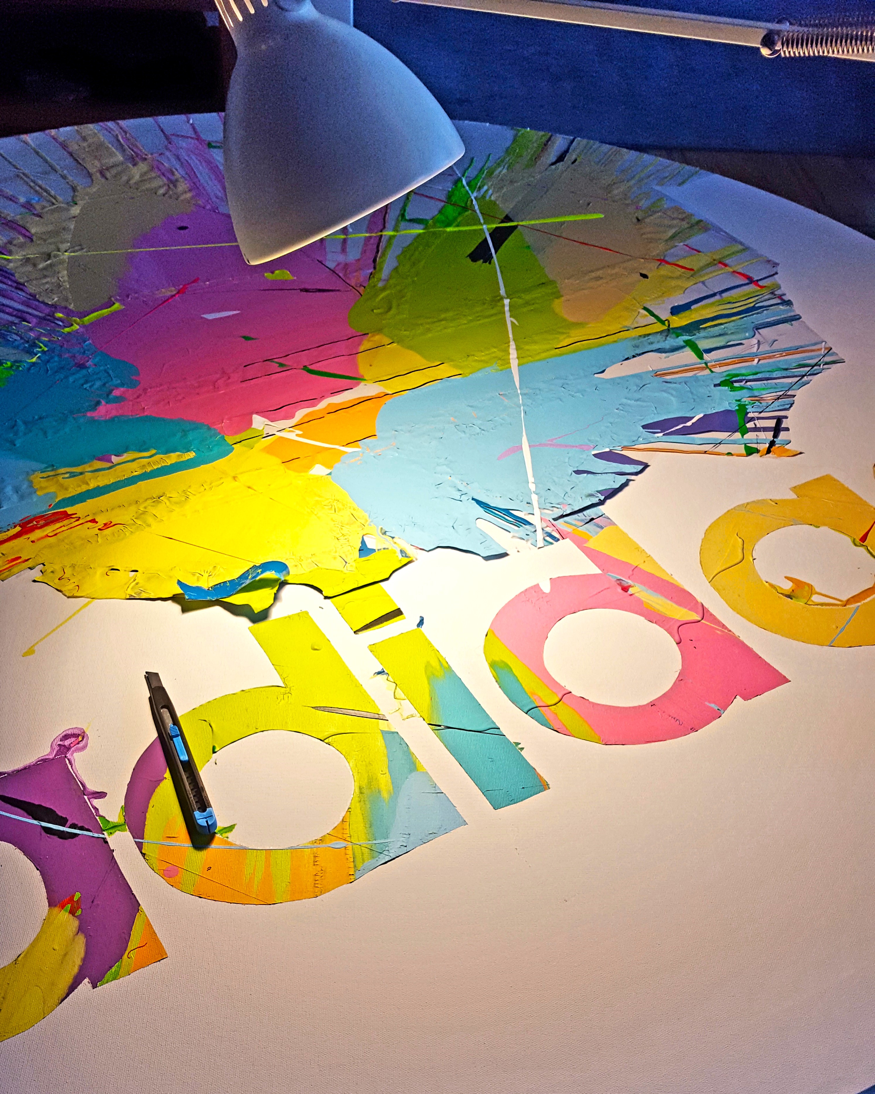 Cutting the Telekom emblem for the commission